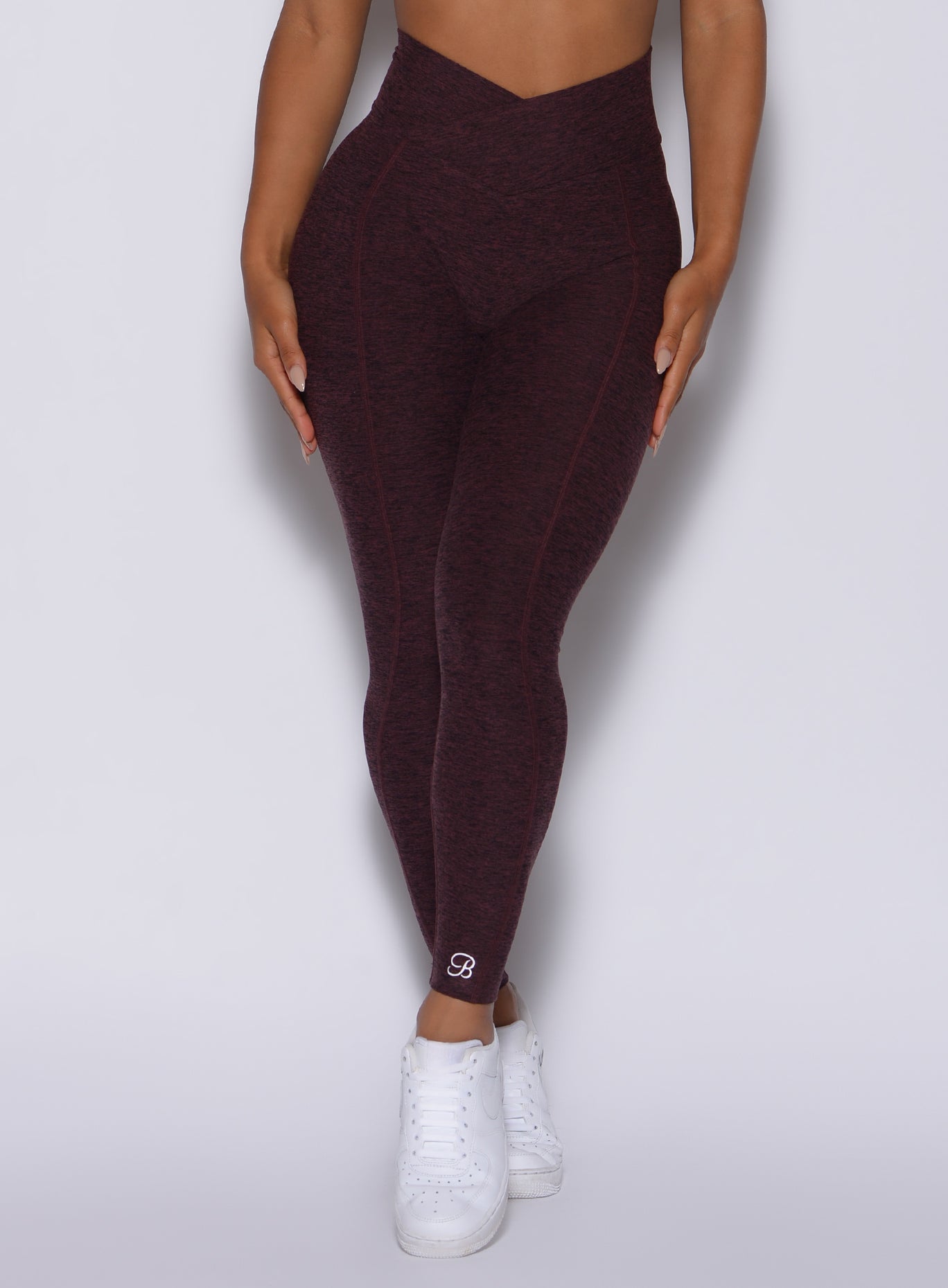 zoomed in front view of our Brazilian contour leggings in port color