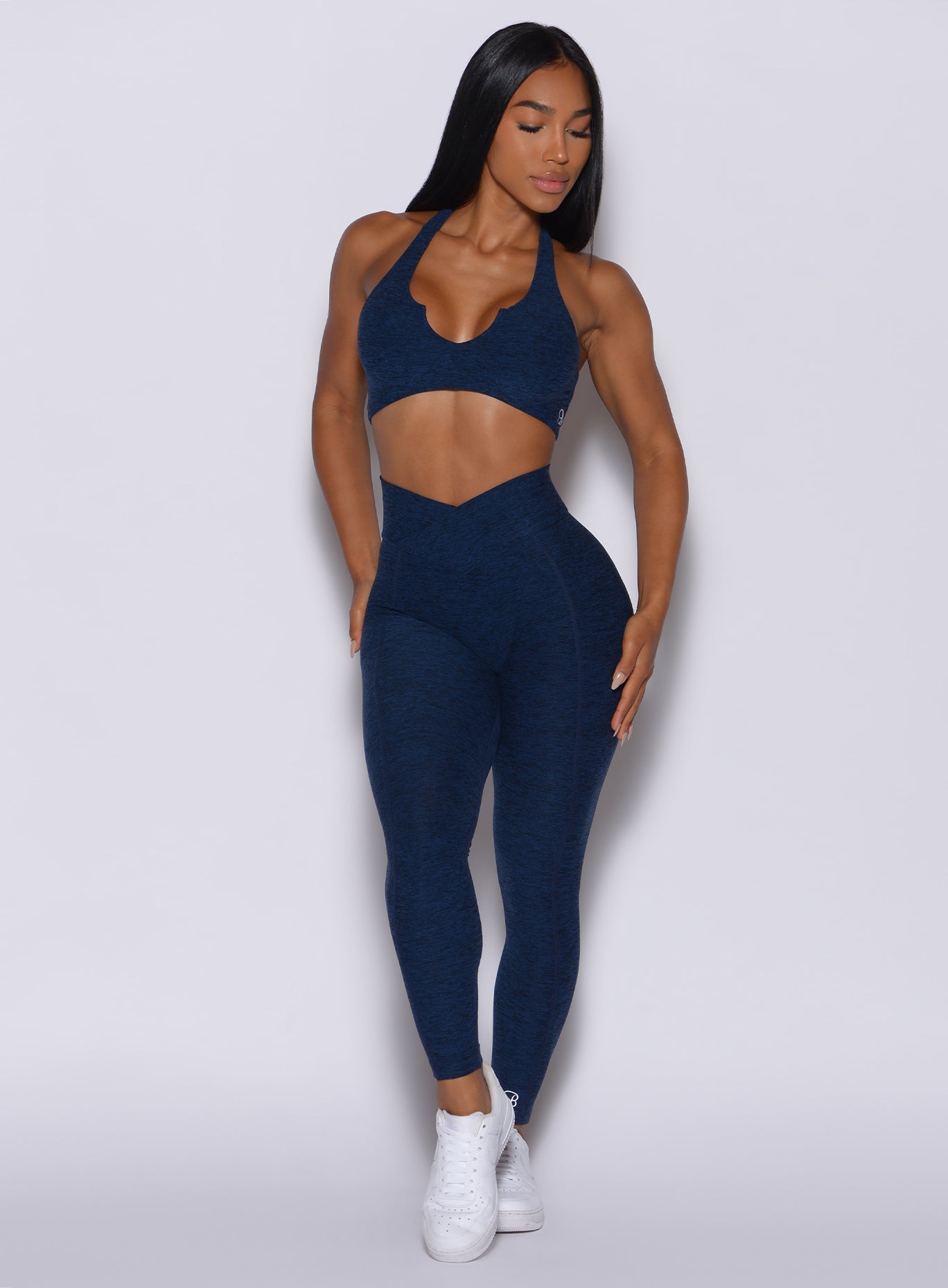 Sapphire Blue Brazilian Contour Leggings featuring a crossover waist and signature scrunch fit.