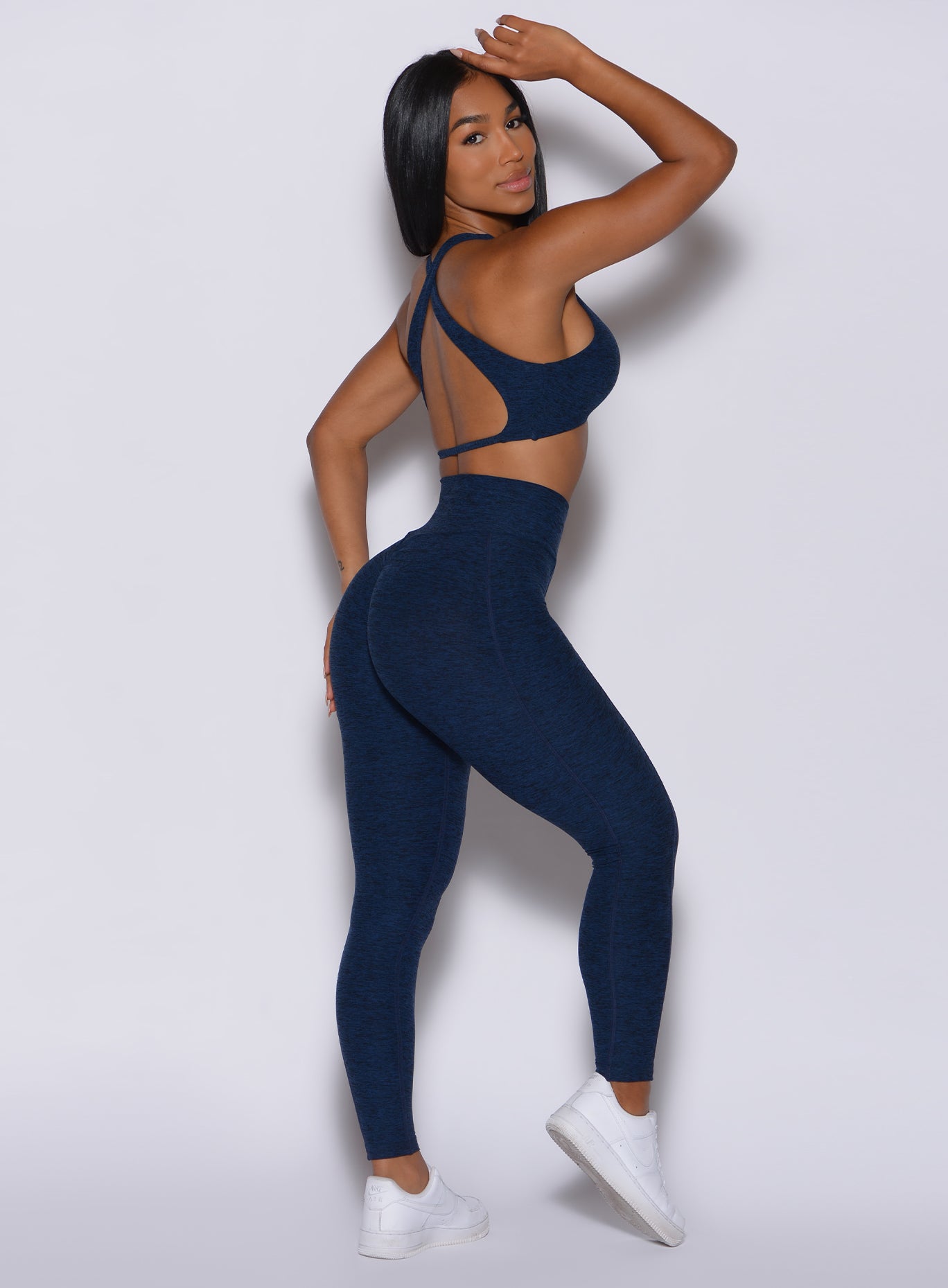 Sapphire Blue Brazilian Contour Leggings with a crossover waist for a sculpted, high-impact fit.