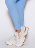 close up detailed shot of the Side ankle scrunch on the Built Leggings in Blue mist color