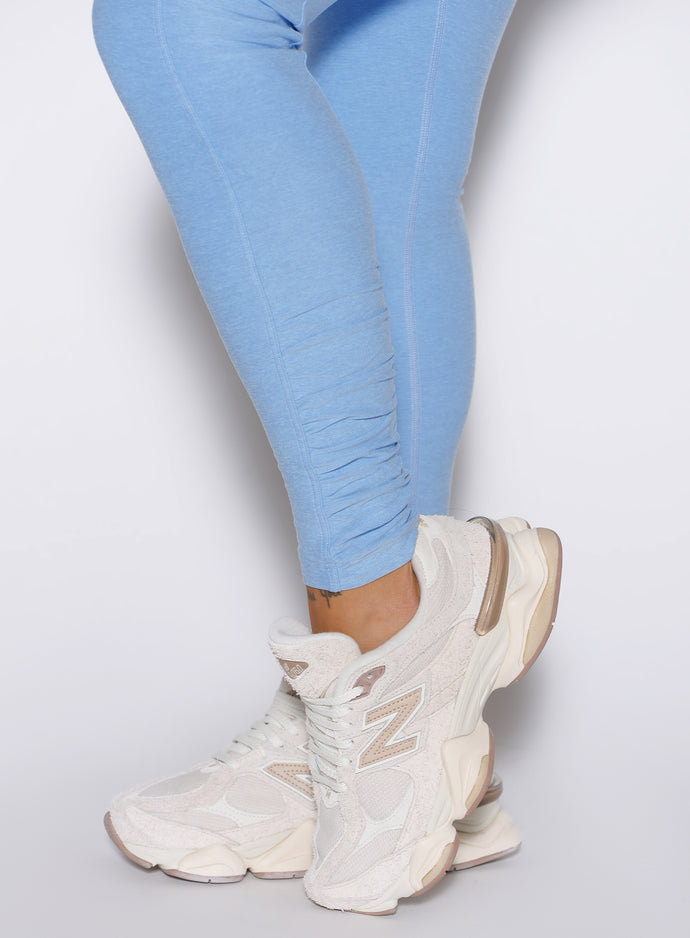 close up detailed shot of the Side ankle scrunch on the Built Leggings in Blue mist color