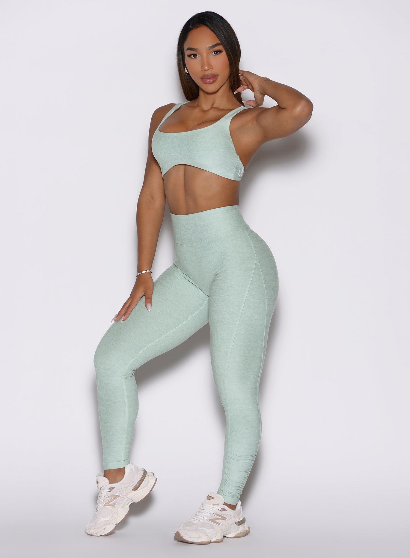 Front view of soft aloe Built Leggings and matching sports bra, high-waisted sculpting gym set.