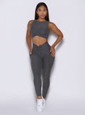 front view of a model wearing the Charm Fit Leggings in Steel Shadow color
