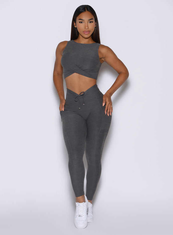 front view of a model wearing the Charm Fit Leggings in Steel Shadow color