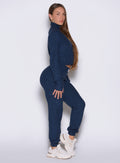 right side profile view of a model wearing the Cloud Comfort Joggers in Sapphire Blue color