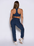 back profile view of a model wearing the Cloud Comfort Joggers in Sapphire Blue color