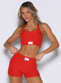 front view of a model wearing the Cloud Lounge Bra in scarlet red color paired with the matching shorts 