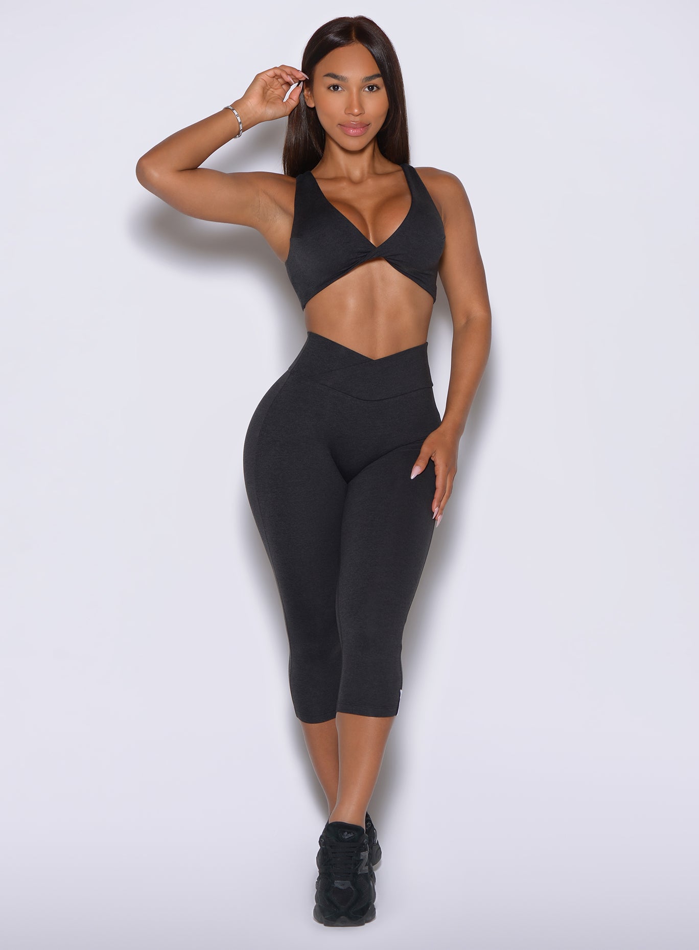 Obsidian black Contour capri leggings featuring a flattering V cut waistband for a snatched fit