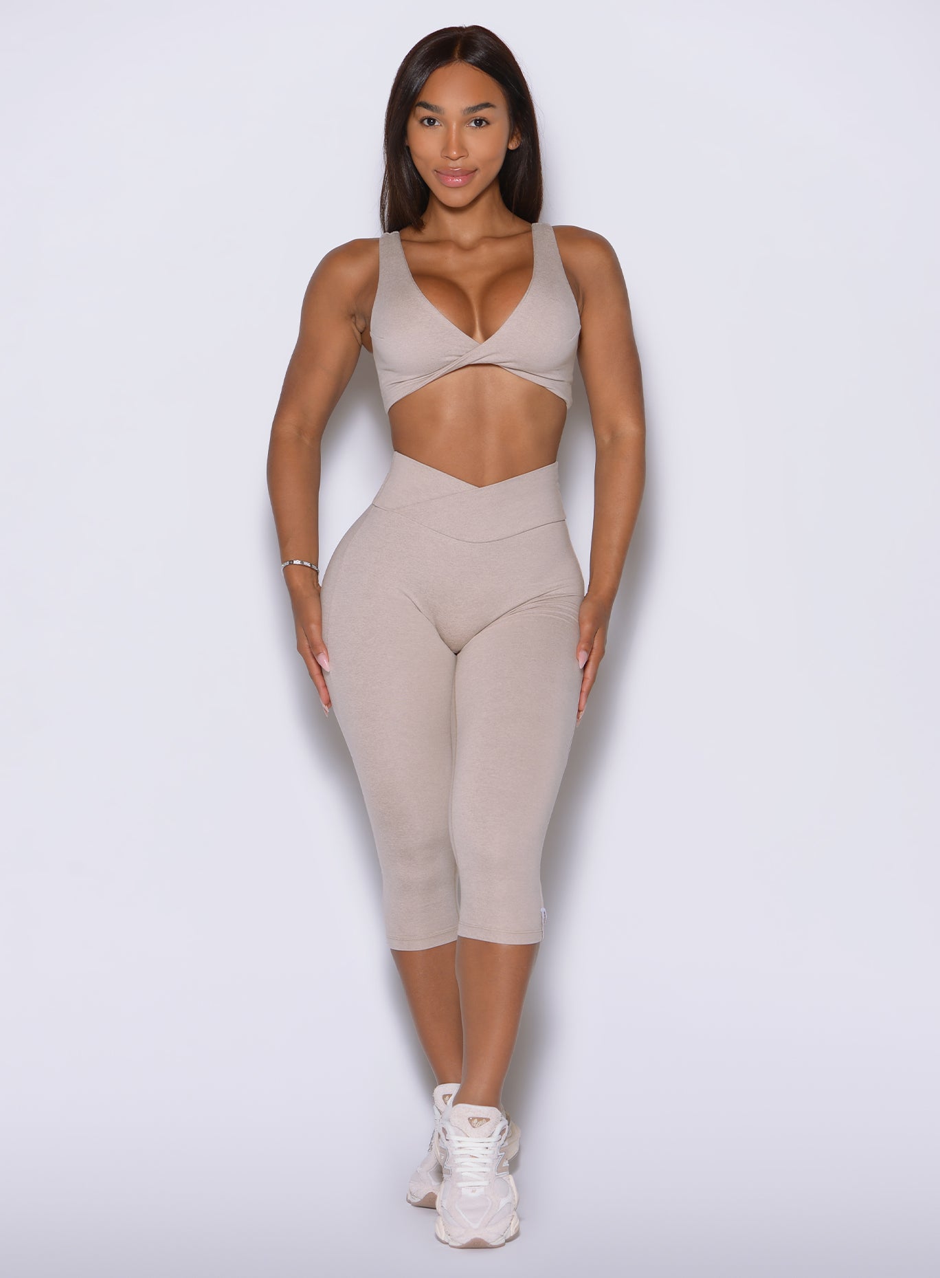 Contour Capri Leggings in Taupe designed with a snatching V-cut waist to enhance your gym style fit