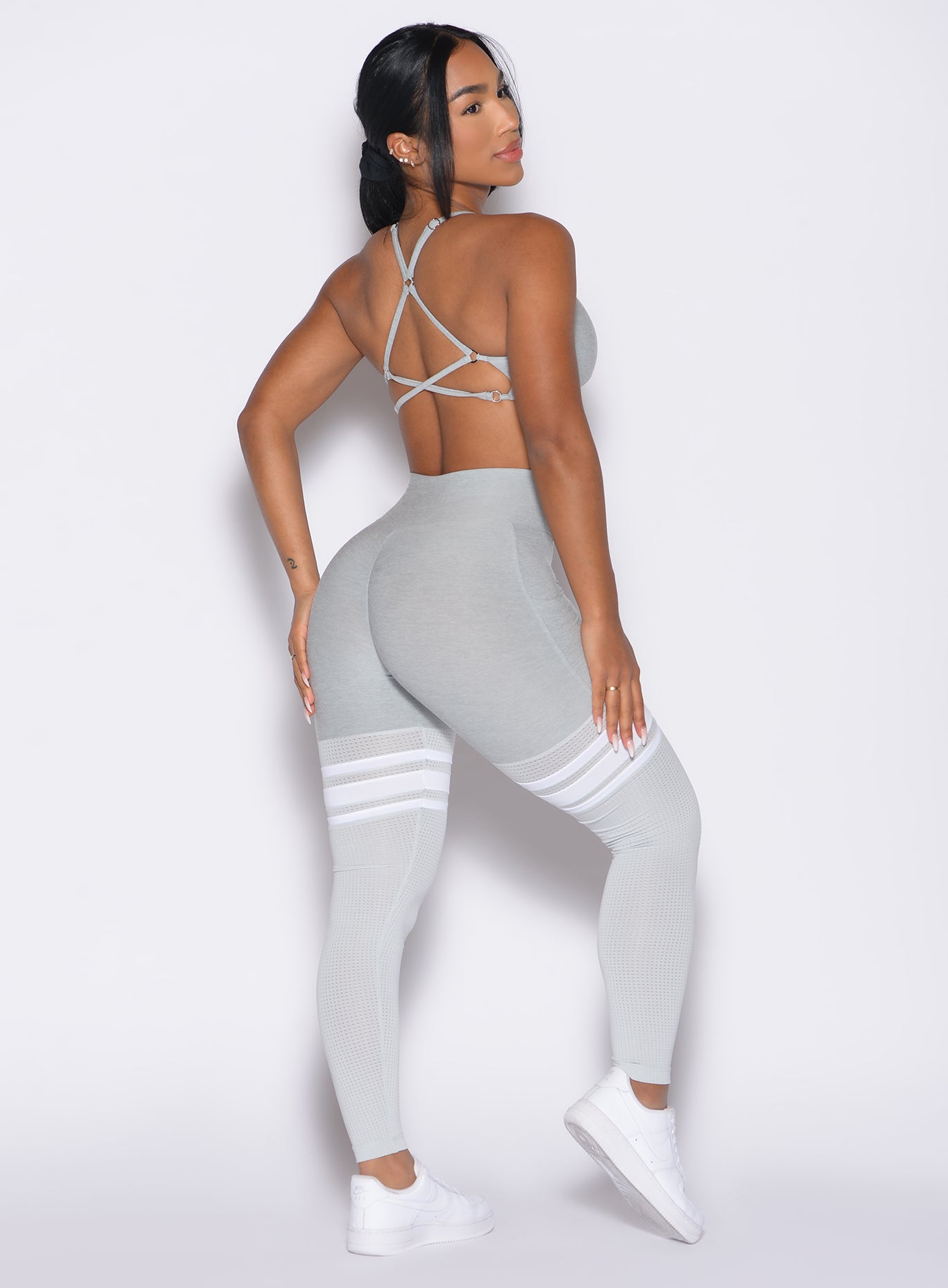 Sculpting Light Cloud Contour Thigh-Highs with a V-cut waistband for high-impact gym training.