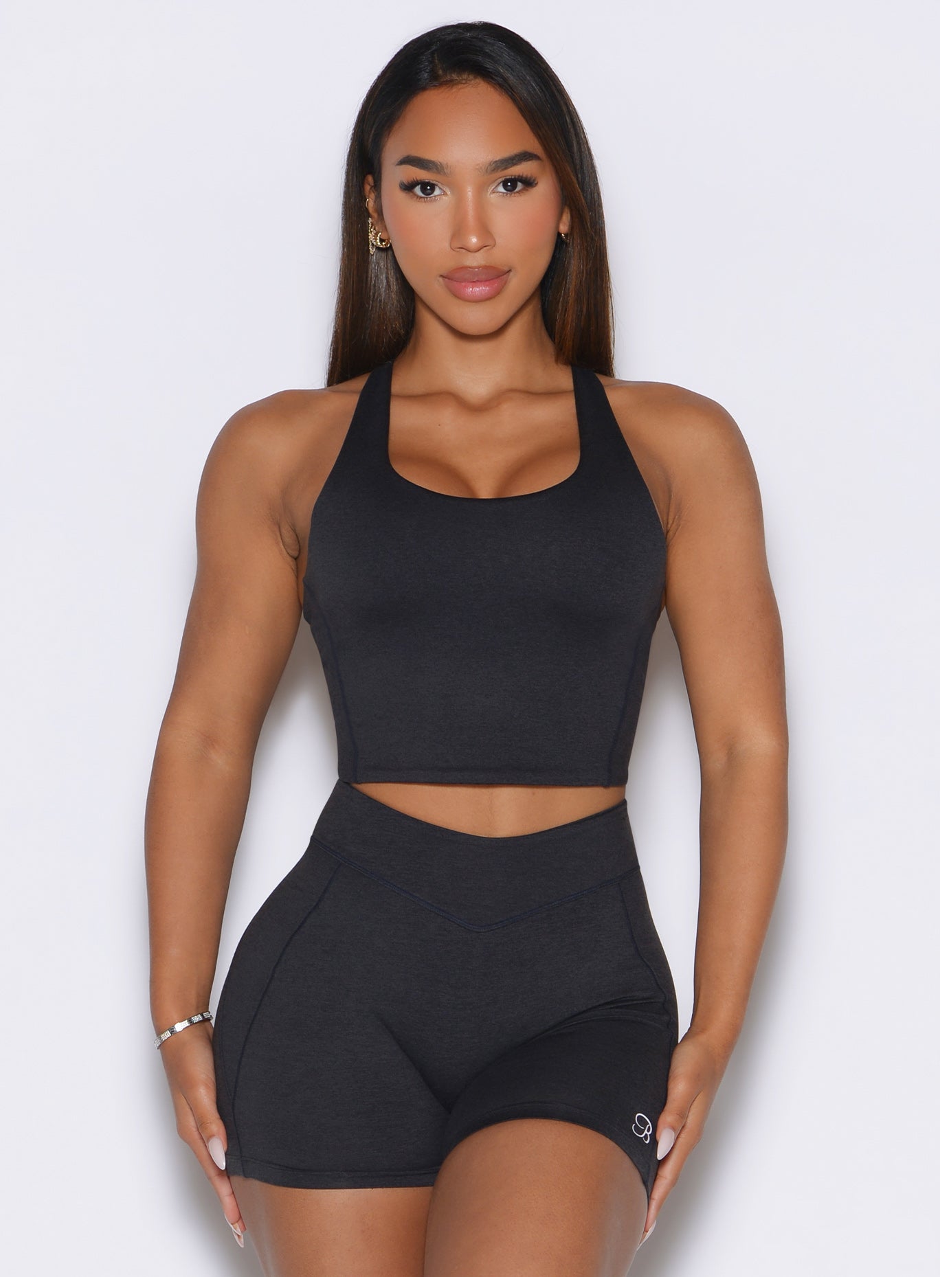 Heathered Black Core Comfort Tank and matching gym shorts in a front profile view.