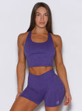 Model captured from the front wearing our Core Comfort Tank in Iris color, paired with matching shorts.