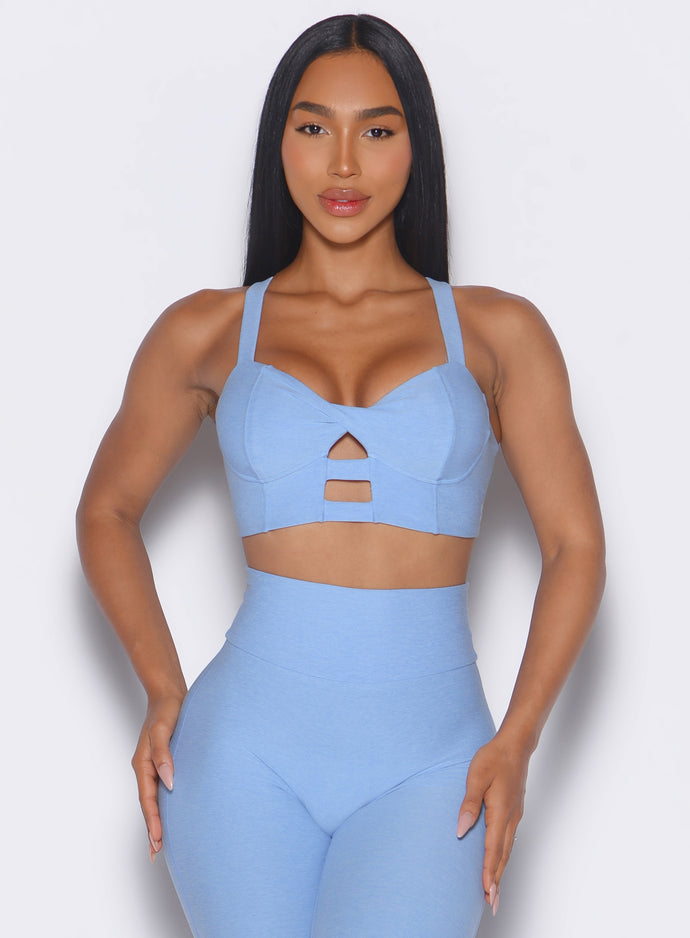 Bright Hydrangea Core Set Bra featuring a twist front and push-up support for a sculpted gym fit.