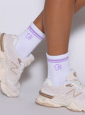 Violet Crew Socks for women featuring a ribbed athletic fit and supportive performance design.