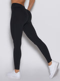 close up side view of a model wearing the Curvemax Leggings in Black color