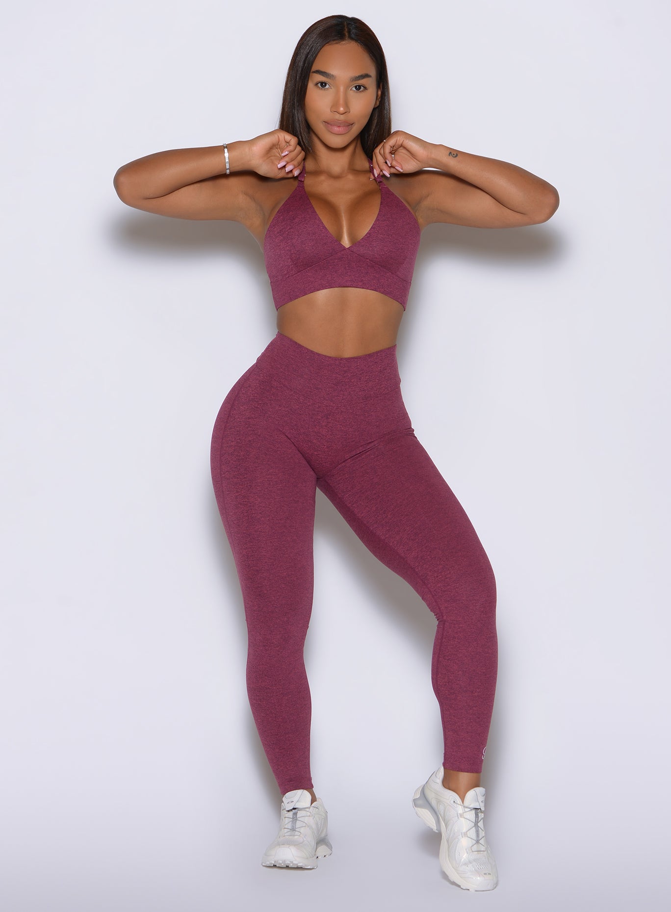 Front athletic look features RaspberryRed CurvePro Leggings with core smoothing support.