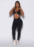 Front view of Obsidian Black Curvemax Leggings featuring a sculpting adjustable V-cut.