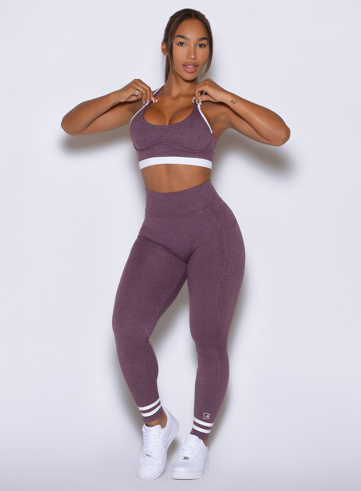 Bombshell Sportswear Regal Purple Curves Crew Leggings embody peerless athletic excellence.