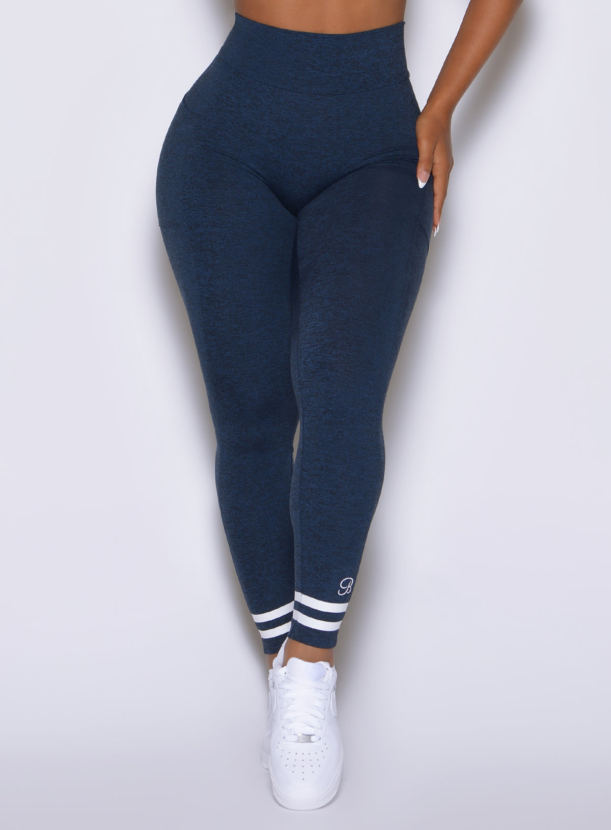 Bombshell Sportswear Sapphire Blue Curves Crew Leggings highlight a sculpting high-rise fit.