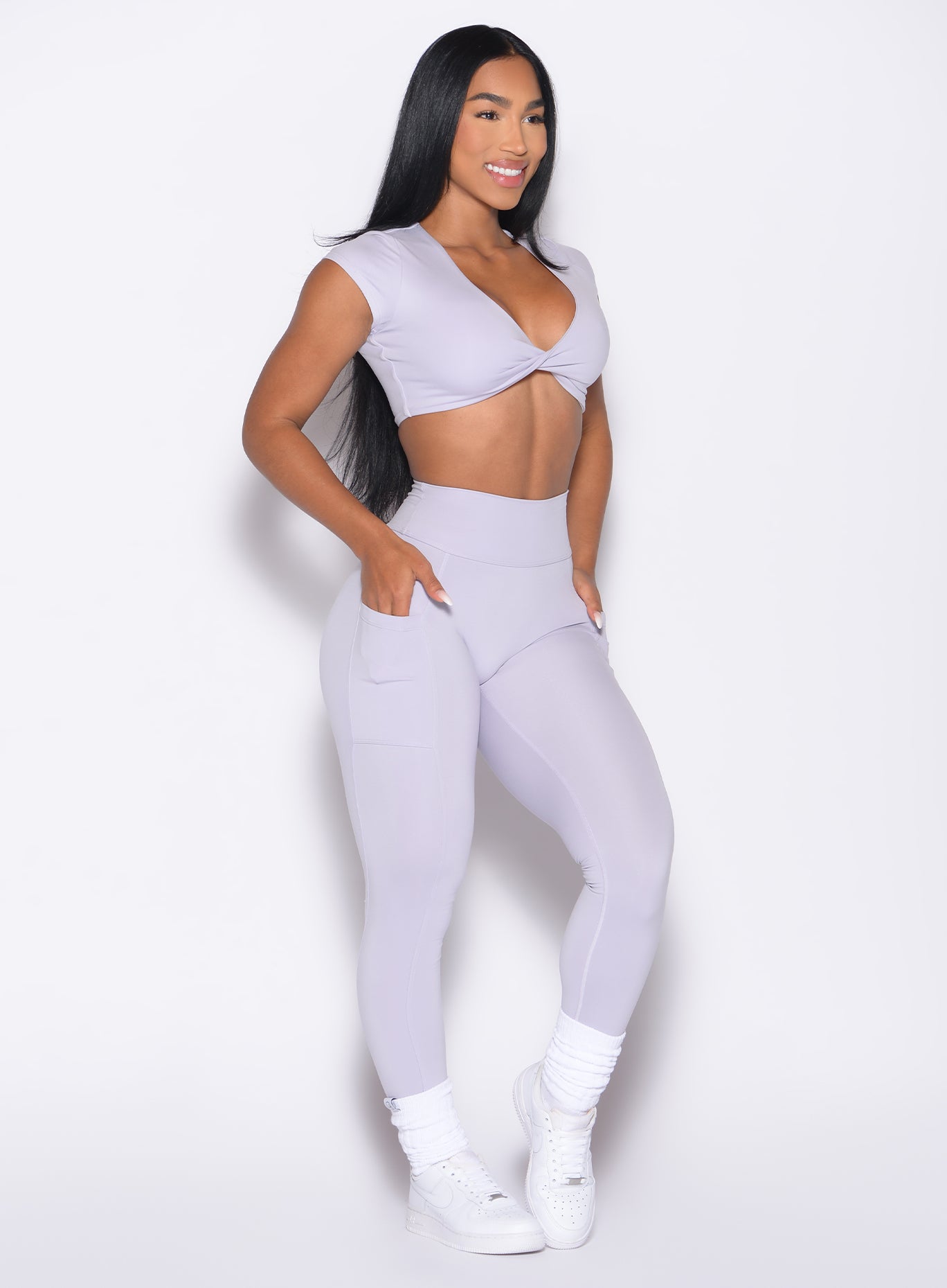 Sculpting Galactic Lilac Define Leggings with side pockets and a supportive high-waisted gym fit.