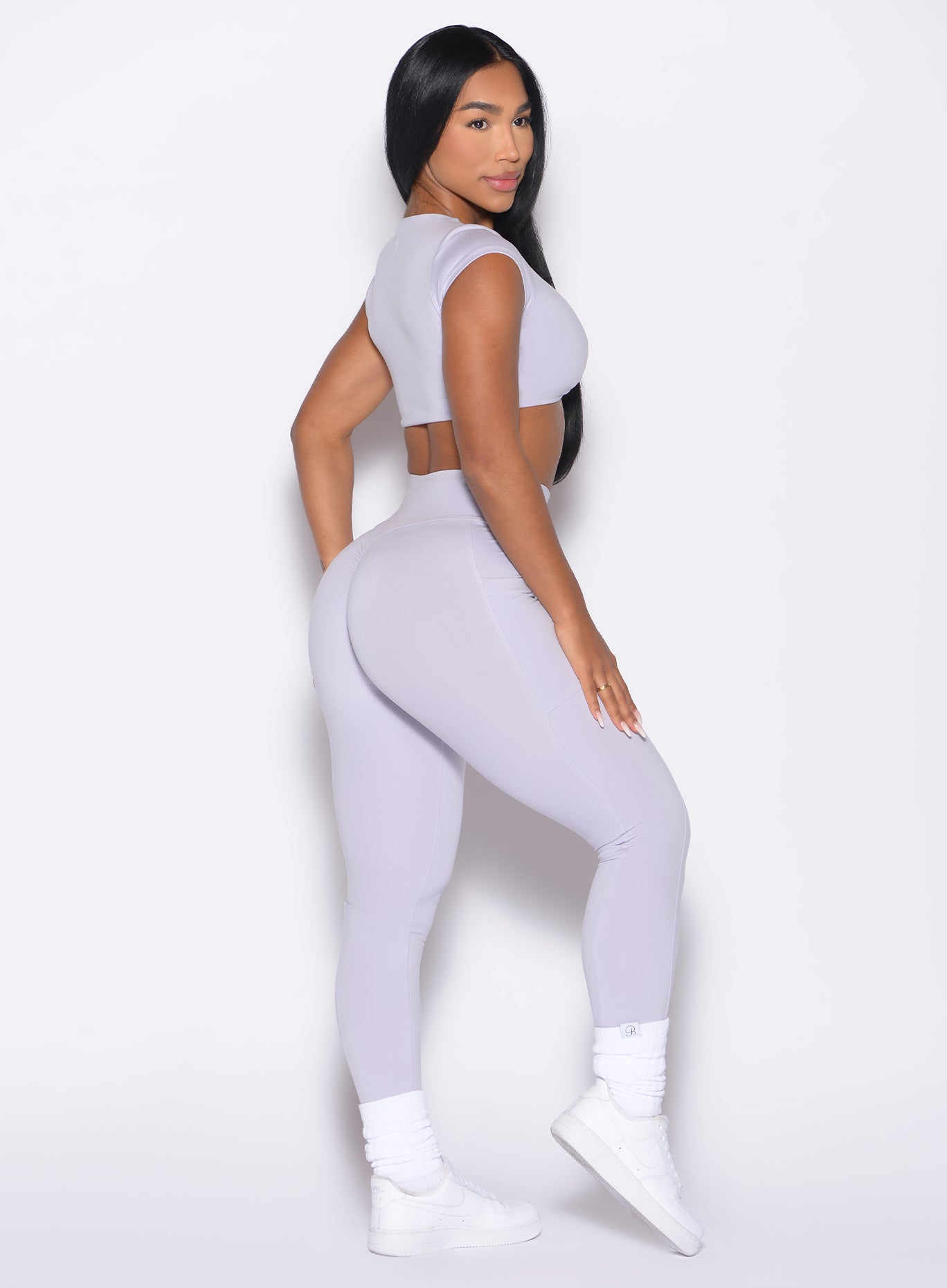 Sculpting Galactic Lilac Define Leggings with side pockets and a secure high-waisted gym fit.
