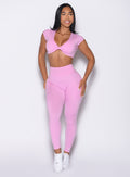 front profile view of a model looking to the left side wearing the Define Leggings in Lilac Chiffon color