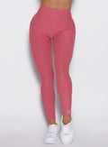 close up front view of a model wearing the Define Leggings in primrose color