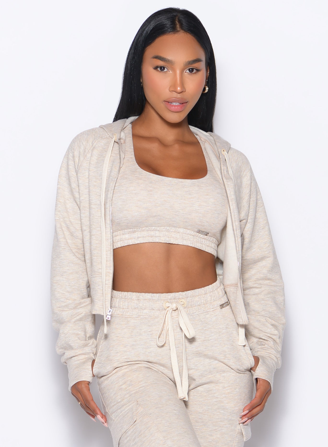 Plush Heathered Oatmeal Sweat Hoodie with full front zipper and thumbholes for recovery.