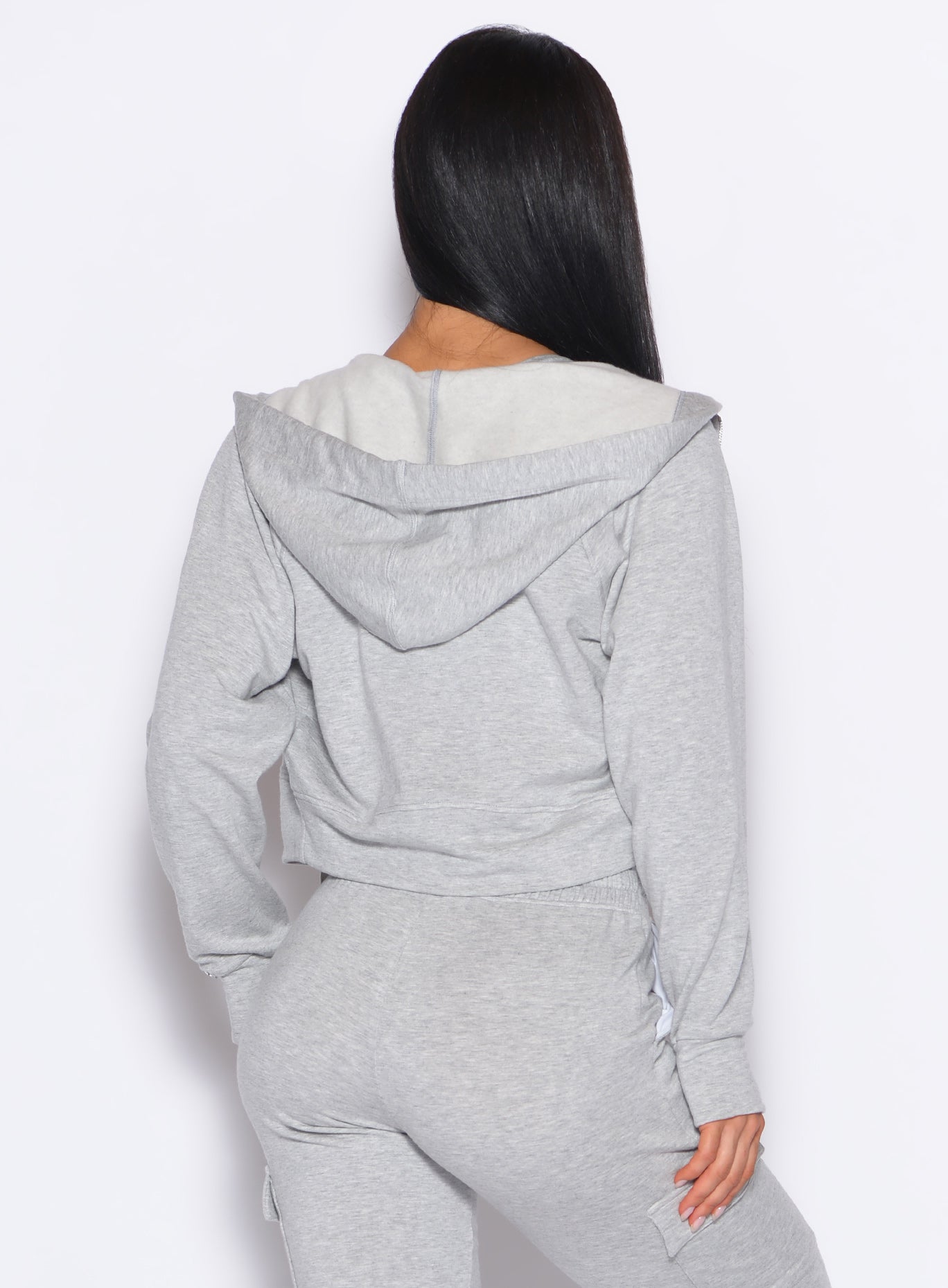 Light Heather Grey Sweat Hoodie featuring cozy fleece and a relaxed, drop-shoulder fit.
