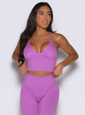 Purple Rain Electric Era Top paired with leggings for a high-performance, sculpting gym look.