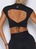 close up back profile shot of a model wearing the FitBoost Tee in Black color