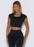 frontal shot of a model wearing the FitBoost Tee in Black color