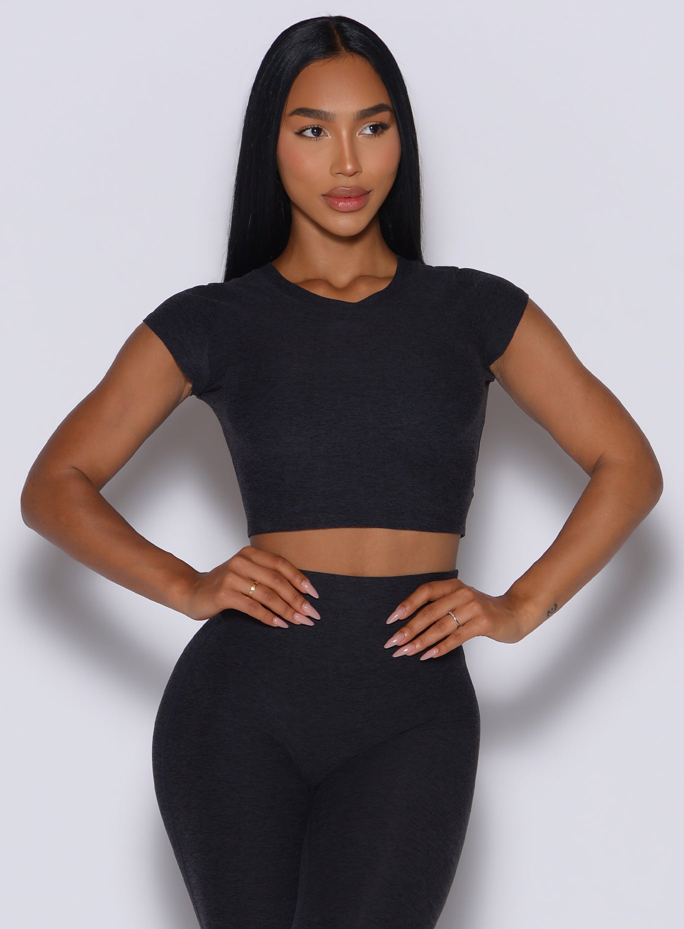 Onyx Fit Fam Active Tee featuring a cropped waist and cap sleeves for a sculpting gym fit.
