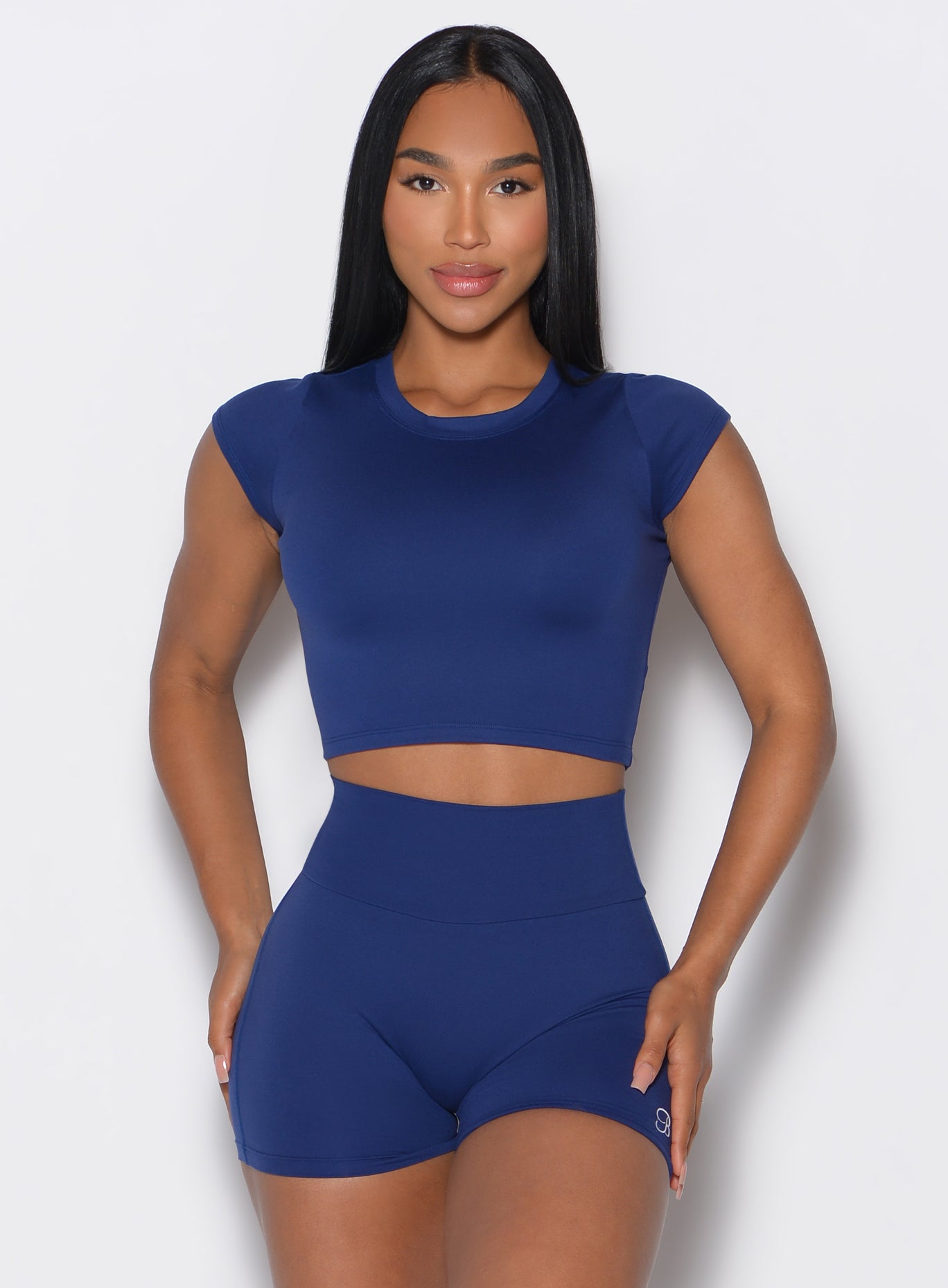 Royal Indigo Fit Fam Active Tee with a cropped waist and cap sleeves for high-performance gym sets.