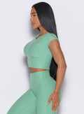 Sage Fit Fam Active Tee with capped sleeves and round neck for a sculpted gym look.