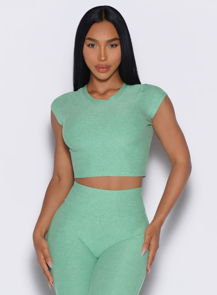 Sage Fit Fam Active Tee with capped sleeves and a cropped fit for breathable gym-to-street style.