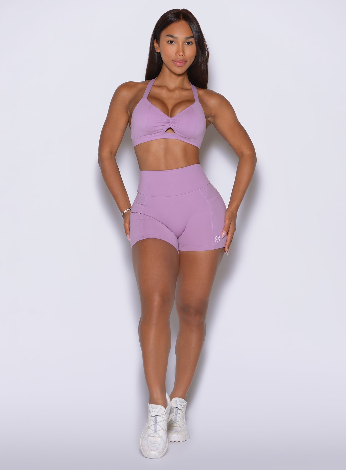 High-rise Smokey Grape gym shorts offer a snatching waistband and functional utility side pockets