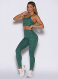 Emerald Green Cheetah Fit Leggings with a high-waisted, sculpting fit and internal scrunch detail.
