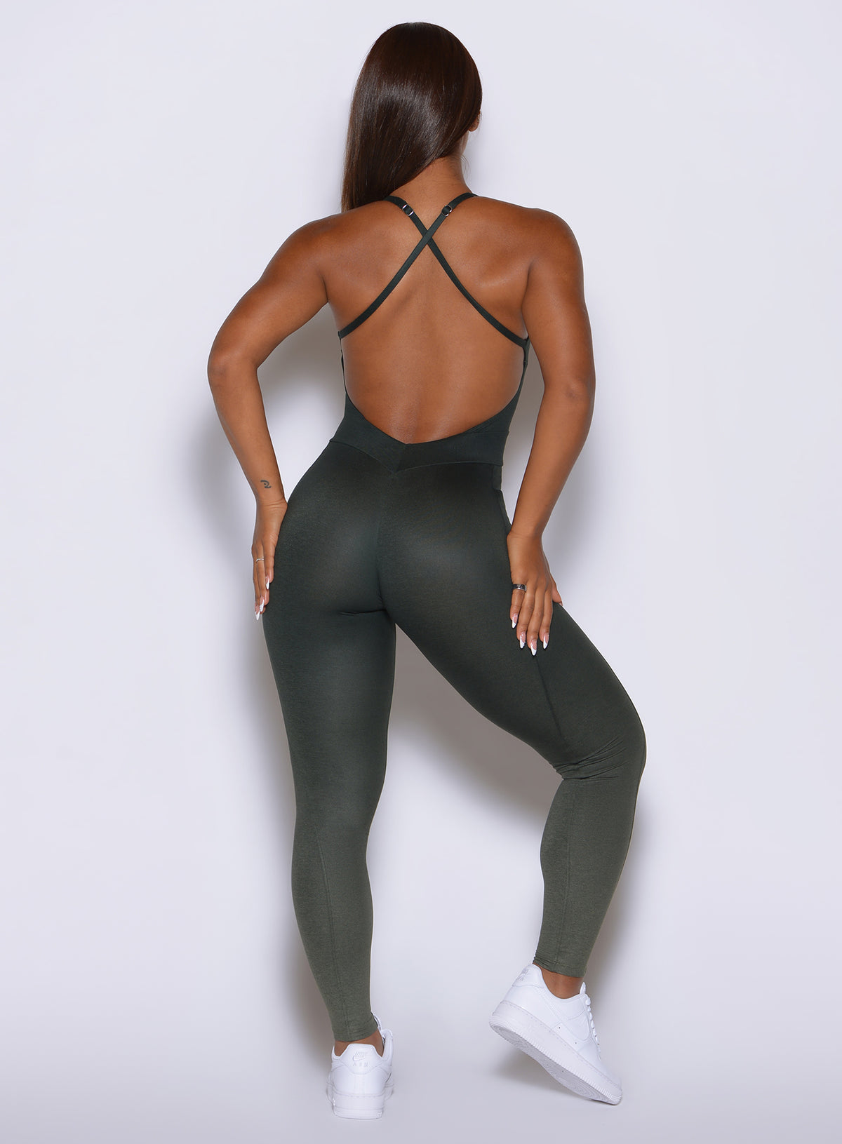 Flatter Bodysuit in Ombre Fern crafted with delicate cross-straps and curve-defining seams.