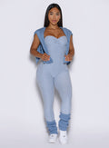 front view of a model wearing the luxe leg warmers-short in niagara mist color paired with the matching flawless form bodysuit
