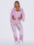 model captured from the front wearing the luxe leg warmers-short in pink paloma color