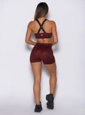 Rear view of high-waisted Black Cherry Cheetah shorts showing a sleek, no-scrunch back.