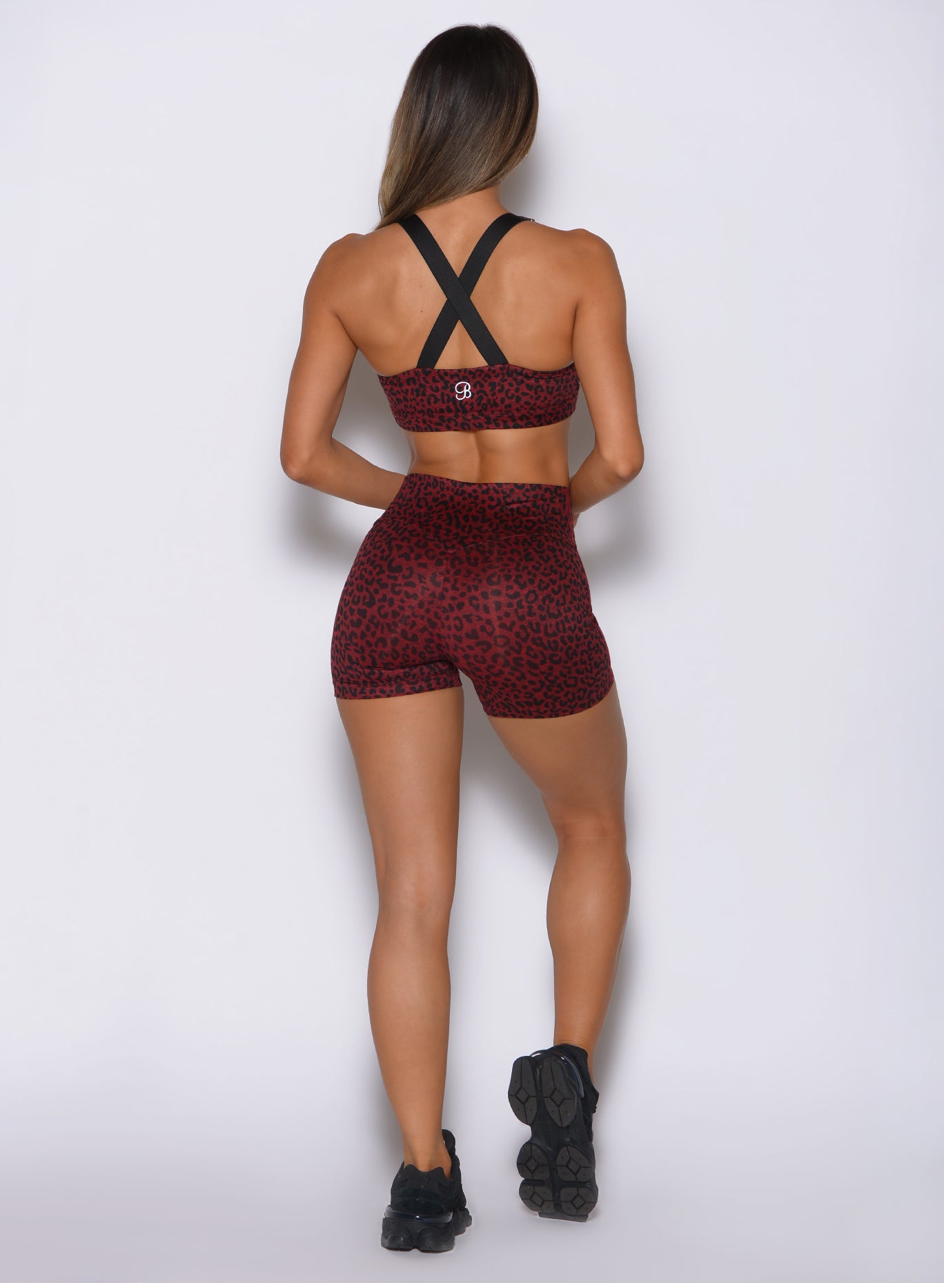 Rear view of high-waisted Black Cherry Cheetah shorts showing a sleek, no-scrunch back.
