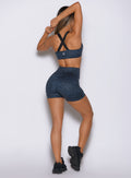 Flexfit Shorts in Night Sky Cheetah highlighting a sculpted fit and supportive high-rise design.