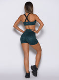 Back view of Ocean Teal Cheetah shorts showing the no-scrunch, distraction-free back.