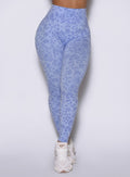 A close up, detailed frontal shot of the model wearing our Flexfit leggings in Leopard Baby Lavender.