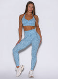 Front profile view of the model wearing our Flexfit leggings in Leopard Glacial Blue.