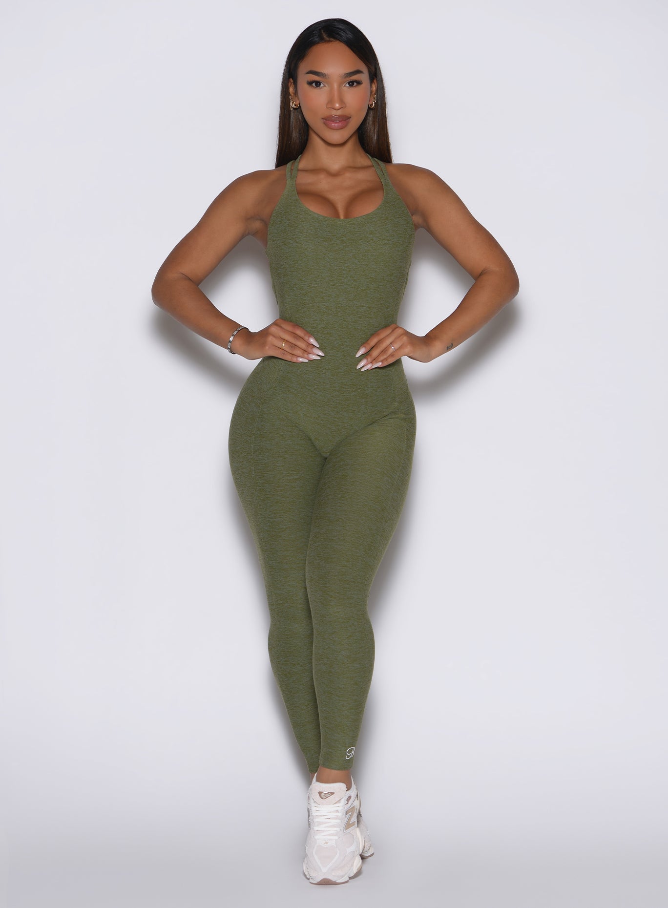Lily Pad Form Bodysuit featuring a high-neck halter design and sculpting, seamless rib-knit fabric.
