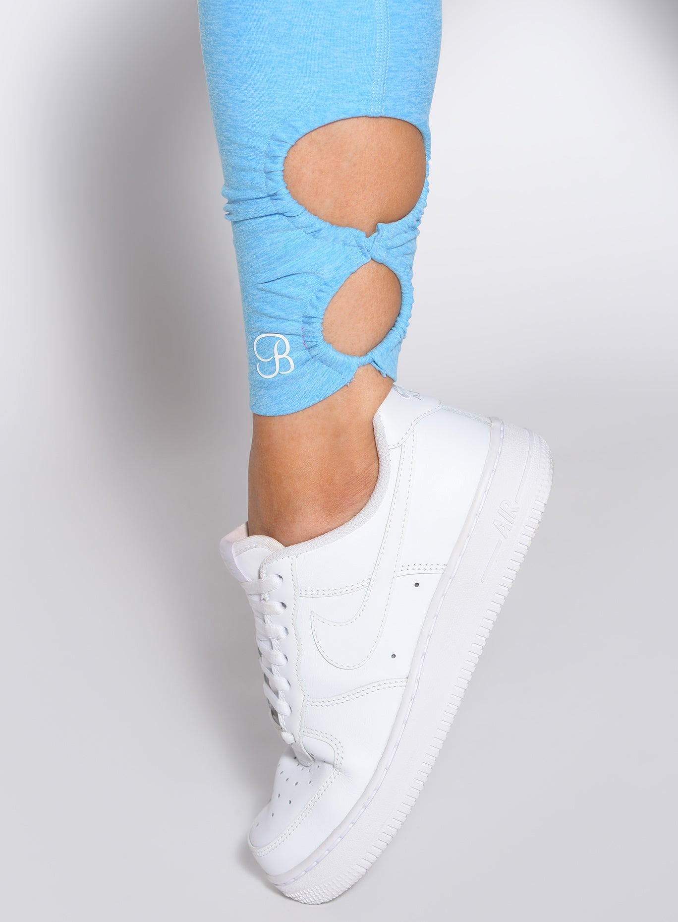 Ocean Breeze Form Flex Leggings featuring detailed ankle cut-outs and a sculpting performance fit.