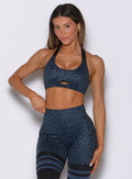 Glow Sports Bra in night sky cheetah color front view highlighting supportive fit and smooth, seamless design.